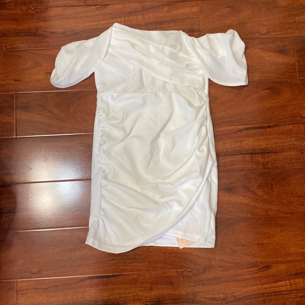Never worn! Too big
